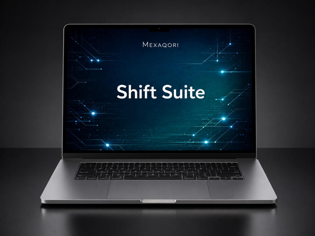 A silver laptop open on a dark surface, displaying a blue tech-style screen with the text 'MEXAQORI' and 'Shift Suite'.